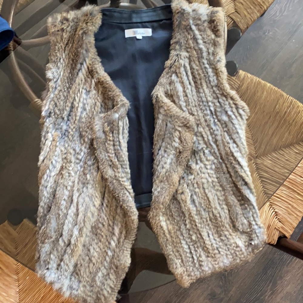 My Tribe 100% rabbit fur and 100% leather vest. Lightweight and flattering.
